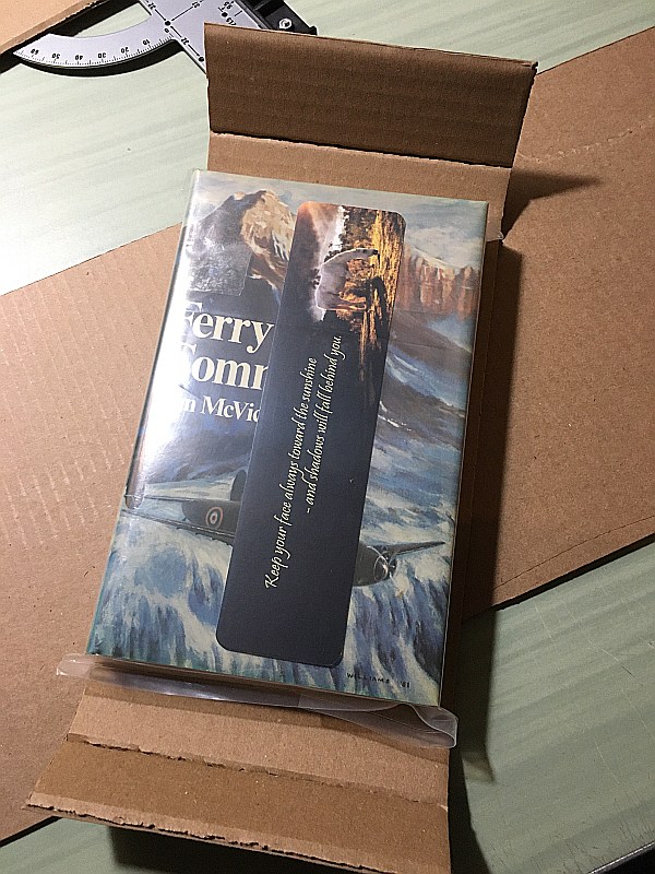 First layer of cardboard fitted to book